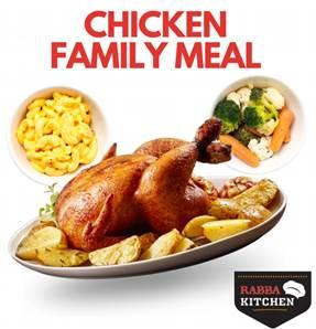 A chicken on a plate with potatoes and vegetables

Description automatically generated