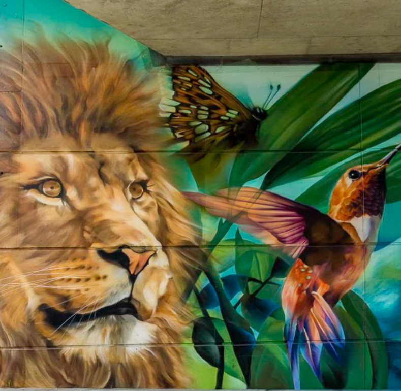 A mural of a lion and a butterfly

Description automatically generated with low confidence